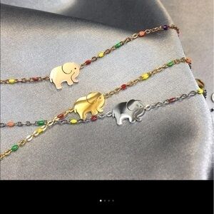 - Enamel Rainbow Elephant Bracelet in stainless
